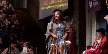 picture of student graduating on stage